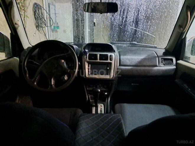 Mitsubishi Pajero io 2004, 740,000 km - 2.0 л - Bakı