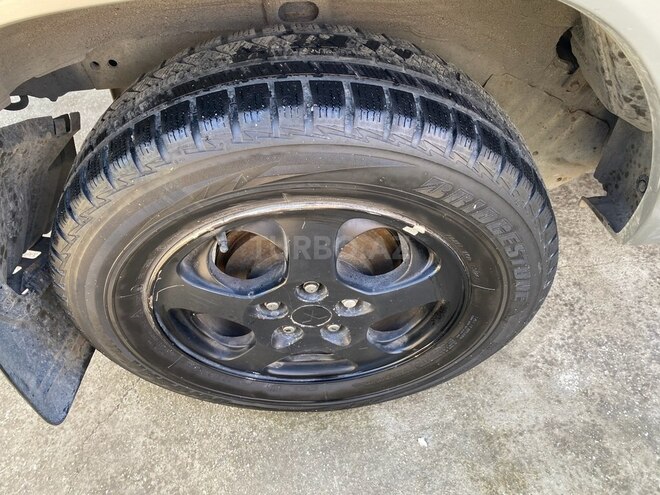 Mitsubishi Pajero io 1999, 290,000 km - 1.8 л - Bakı