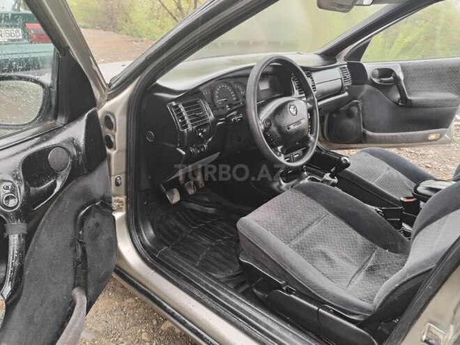 Opel Vectra 1996, 273,574 km - 1.6 l - Qazax