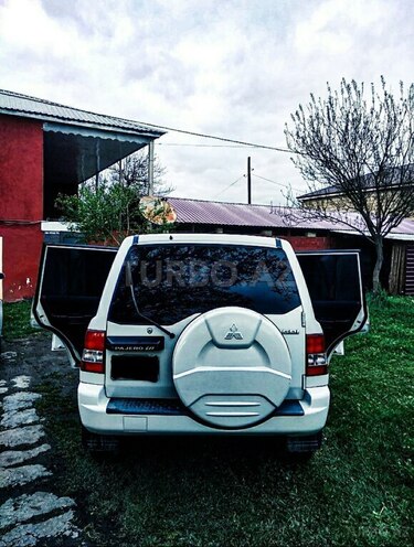 Mitsubishi Pajero io 2000, 270,000 km - 2.0 л - Qax