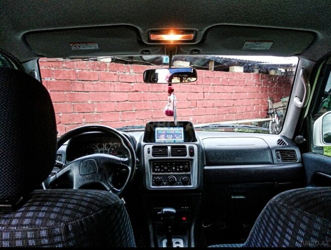 Mitsubishi Pajero io 2000, 270,000 km - 2.0 л - Qax