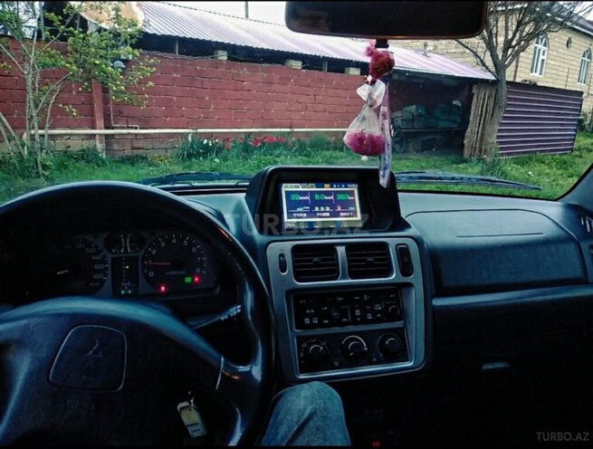 Mitsubishi Pajero io 2000, 270,000 km - 2.0 л - Qax