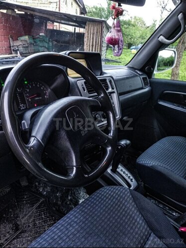 Mitsubishi Pajero io 2000, 270,000 km - 2.0 л - Qax