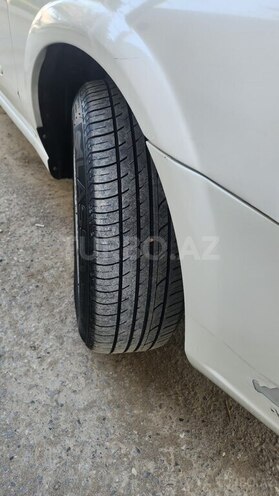 Nissan Sunny 2011, 289,000 km - 1.6 l - Bakı