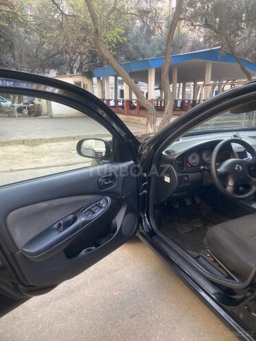Nissan Sunny 2009, 170,000 km - 1.3 l - Bakı