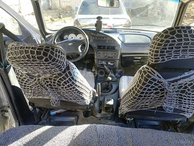 Chevrolet Niva 2006, 123,233 km - 1.7 л - Quba