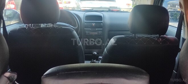 Opel Astra 1999, 250,000 km - 1.6 l - Quba