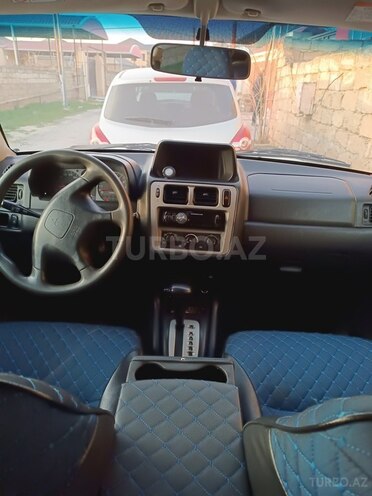 Mitsubishi Pajero io 2003, 327,000 km - 2.0 л - Bakı