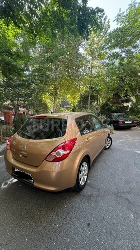 Nissan Tiida 2009, 255,000 km - 1.6 л - Bakı