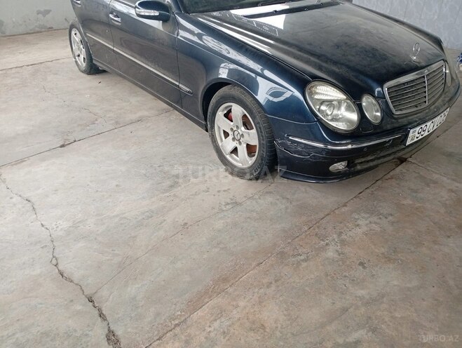 Mercedes E 240 2003, 250,000 km - 2.6 l - Saatlı