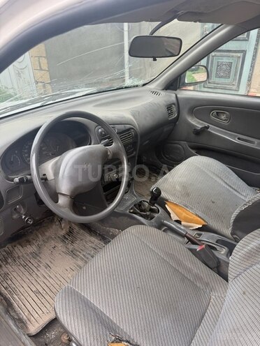 Mitsubishi Lancer 1997, 250,000 km - 1.3 l - Quba