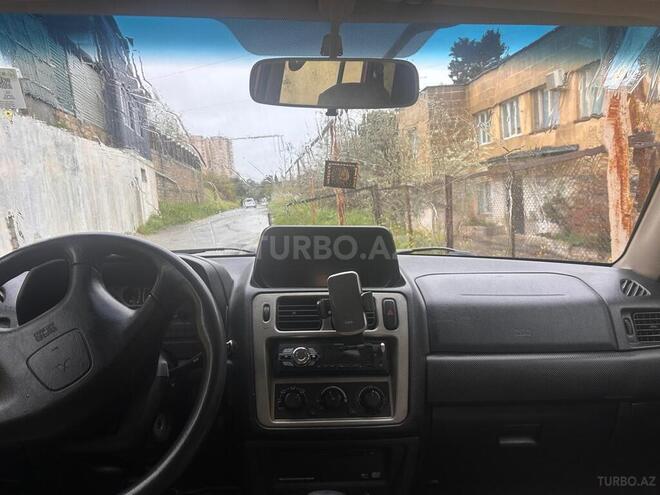Mitsubishi Pajero io 2002, 200,000 km - 2.0 l - Bakı