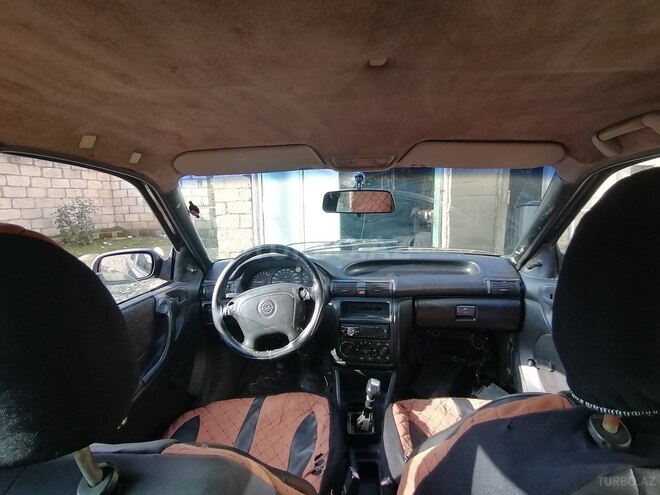 Opel Astra 1993, 100,000 km - 1.8 l - Xudat
