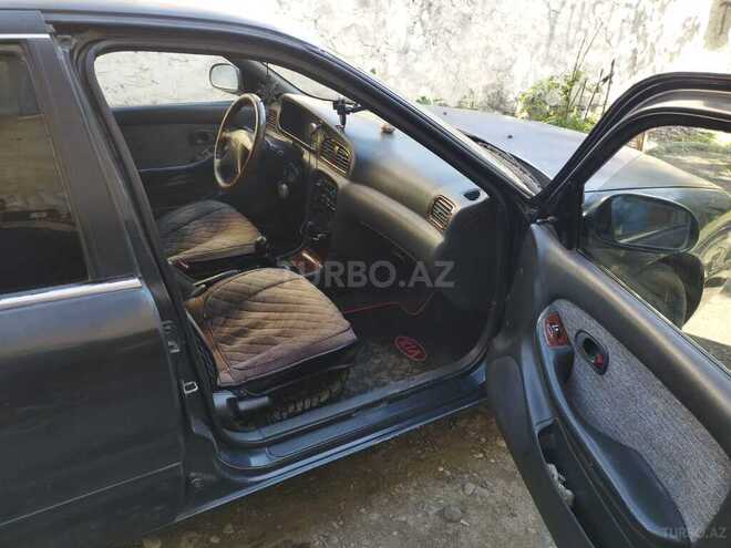 Kia Clarus 1997, 358,000 km - 2.0 l - Yevlax