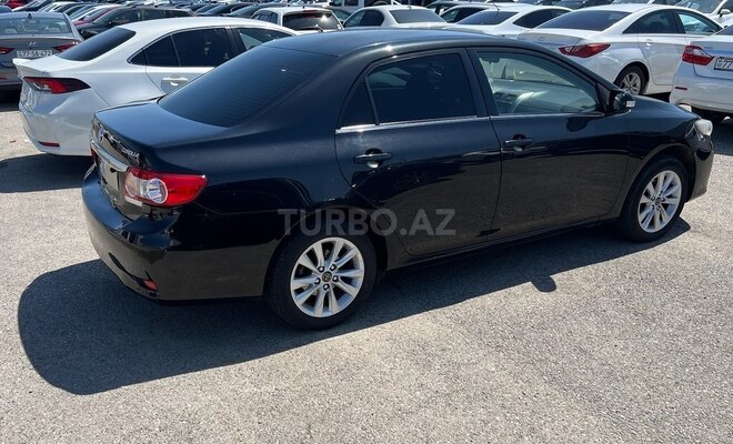 Toyota Corolla 2013, 246,000 km - 1.6 l - Bakı