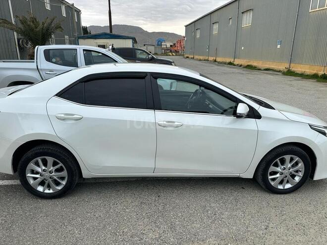 Toyota Corolla 2014, 165,000 km - 1.6 l - Bakı