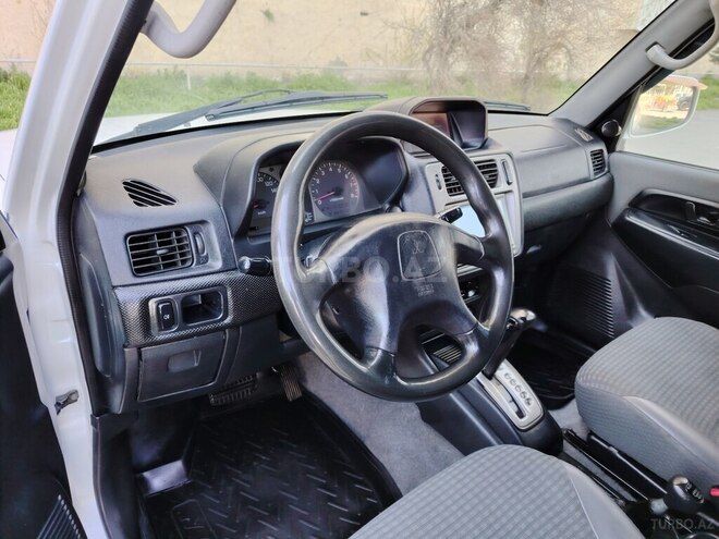 Mitsubishi Pajero io 1999, 32,000 km - 1.8 l - Bakı
