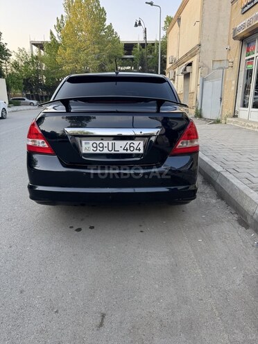 Nissan Tiida 2006, 332,528 km - 1.8 л - Yevlax