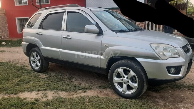 Kia Sportage 2009, 236,000 km - 2.0 l - Bakı