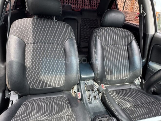 Nissan Sunny 2007, 239,000 km - 1.6 л - Bakı