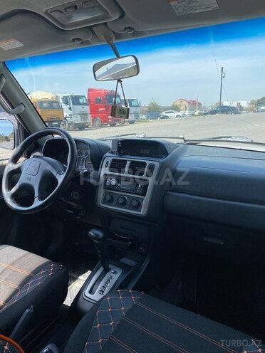 Mitsubishi Pajero io 2002, 300,000 km - 2.0 l - Bakı