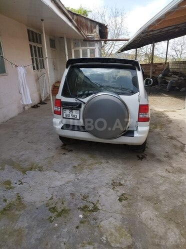 Mitsubishi Pajero io 2004, 200,000 km - 2.0 l - Bakı