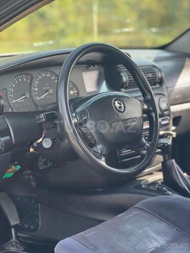 Opel Omega 1998, 300,000 km - 2.0 л - Quba