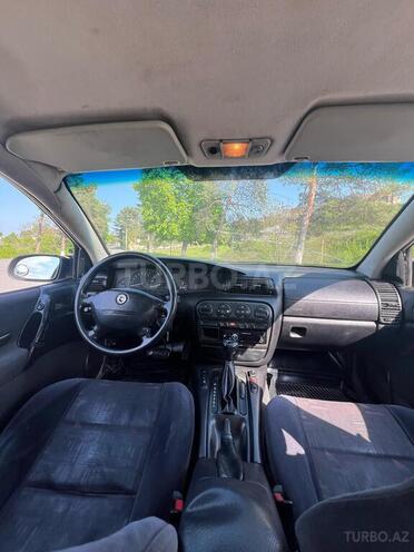 Opel Omega 1998, 300,000 km - 2.0 л - Quba