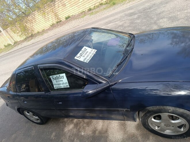 Opel Vectra 1998, 250,000 km - 1.6 l - Quba