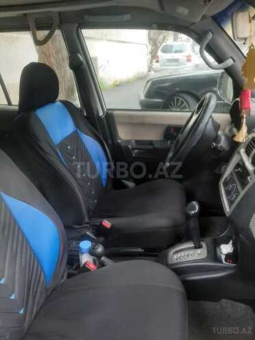 Mitsubishi Pajero io 2002, 250,000 km - 2.0 l - Bakı