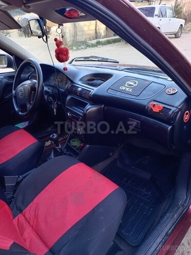 Opel Astra 1997, 444,000 km - 1.6 l - Qusar