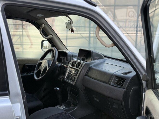 Mitsubishi Pajero io 2003, 298,000 km - 2.0 л - Bakı