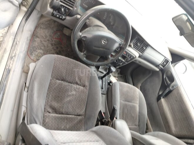 Opel Vectra 1996, 350,000 km - 1.8 l - Quba