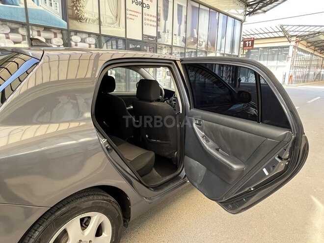 Toyota Corolla 2006, 219,000 km - 1.4 l - Bakı