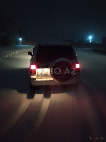 Mitsubishi Pajero io 1999, 250,000 km - 1.8 l - Bakı