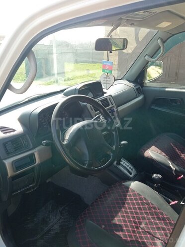 Mitsubishi Pajero io 1999, 250,000 km - 1.8 l - Bakı