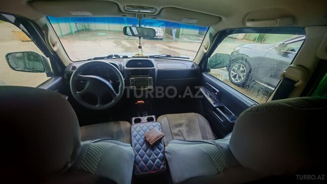 Mitsubishi Pajero io 2002, 268,000 km - 2.0 l - Gəncə