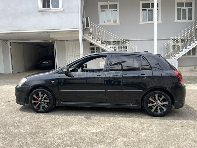 Toyota Corolla 2004, 240,000 km - 1.4 l - Bakı