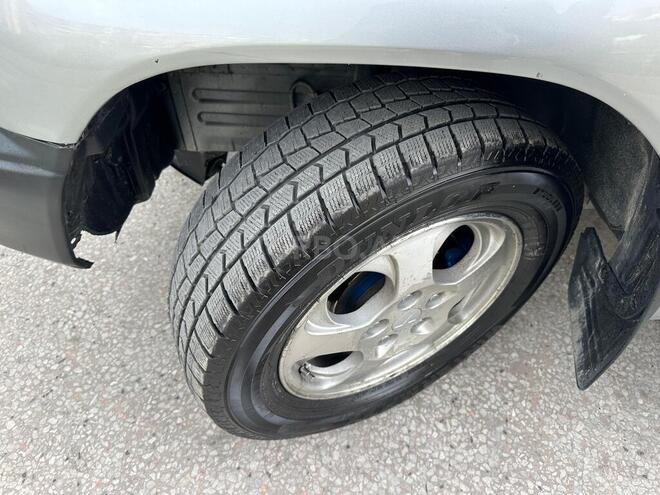 Mitsubishi Pajero io 1999, 300,000 km - 1.8 l - Bakı