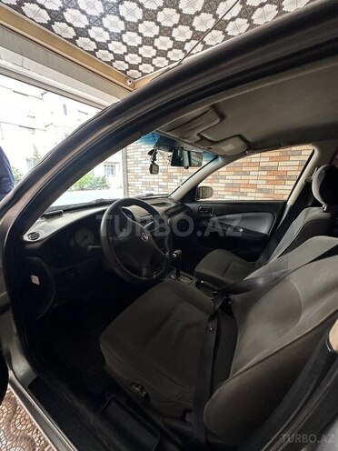Nissan Sunny 2006, 295,000 km - 1.3 l - Bakı