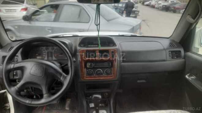 Mitsubishi Pajero io 2003, 150,000 km - 2.0 l - Bakı