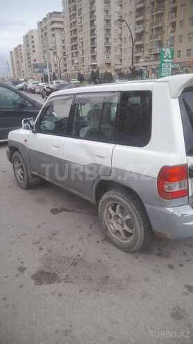 Mitsubishi Pajero io 2003, 150,000 km - 2.0 l - Bakı