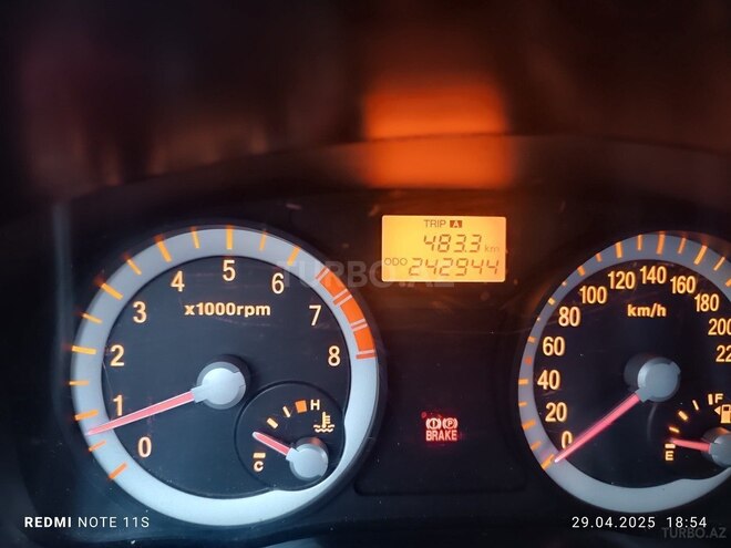 Kia Rio 2009, 242,944 km - 1.4 l - Quba