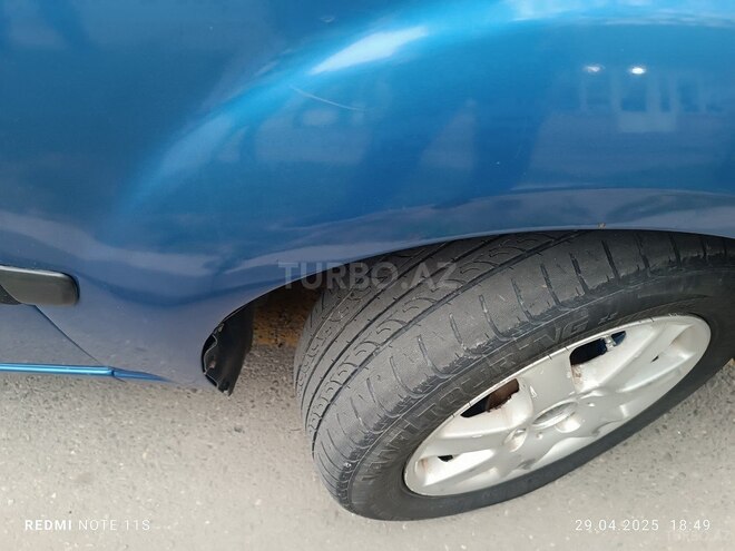 Kia Rio 2009, 242,944 km - 1.4 l - Quba