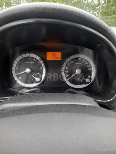 Kia Rio 2009, 242,944 km - 1.4 l - Quba