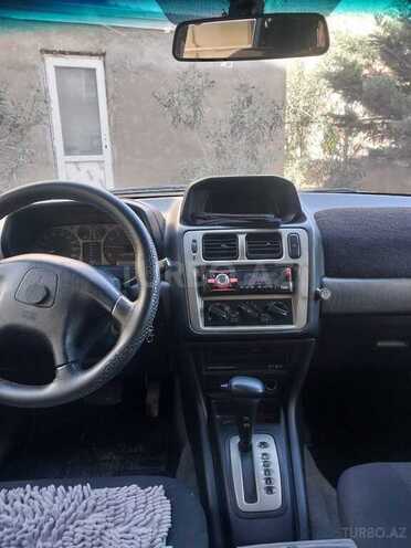 Mitsubishi Pajero io 1999, 300,000 km - 1.8 l - Bakı