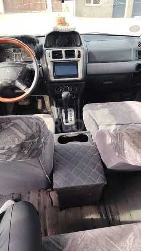 Mitsubishi Pajero io 2001, 245,200 km - 2.0 l - Bakı