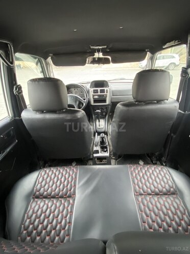 Mitsubishi Pajero io 1999, 142,800 km - 1.8 l - Bakı