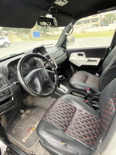 Mitsubishi Pajero io 1999, 142,800 km - 1.8 l - Bakı