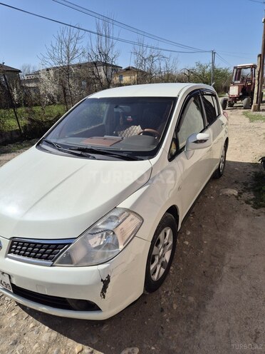 Nissan Tiida 2007, 230,000 km - 1.8 л - Quba